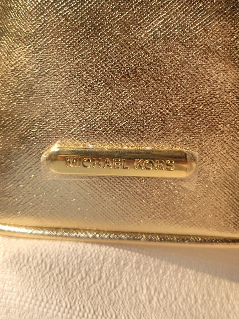 Michael Kors Metallic Cosmetic Case & 5 Piece Cherry Bag Charm Bundle